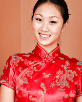 Amateur Asian babe model Evelyn Lin revealing tiny tits and shaved cooch