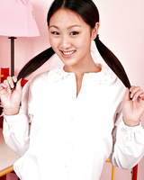 Asian amateur Evelyn Lin reveals tiny tits and shaved Oriental pussy