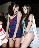 Clubbing chicks in sexy costumes have sex with men and women inside a club