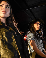 Lesbians Melissa Moore & Gina Valentina having strapon sex in the bathroom