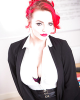 Buxom teacher Jasmine James exposes big tits while posing in black nylons