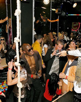 Drunk chicks douse themselves in champagne before sucking cock in nightclub