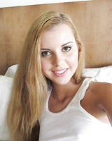 Pretty Latina female Jessie Rogers taking selfies of shaved cunt and tiny tits