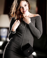 Clothed pornstar Jodi Taylor freeing flat chest and bush from slinky dress