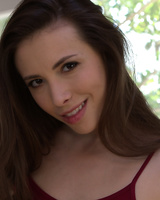 Solo girl Casey Calvert shows off her sexy ass in and out of red panties