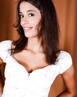 Skinny MILF solo girl Khloe Kash exposing small breasts and shaved snatch