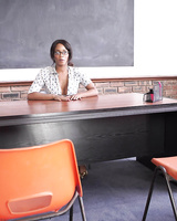 Ebony schoolteacher Kiki Minaj sports the no panty upskirt look on her desk