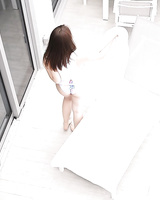 Brunette teen Kylie Quinn caught masturbating on balcony by voyeur