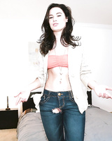 Brunette chick Kymberlee letting bald snatch loose from ripped jeans