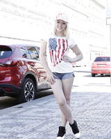 Blonde babe Lola Taylor sliding shorts and panties over phat pornstar ass