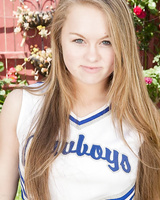 Teen cheerleader Madison Chandler spreads her pink pussy wide open on walkway