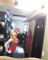 Cute blonde babe with big tits Madison undressing her lingerie