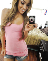 Pretty Latina ex-gf Melanie Rios taking topless self shots in the mirror