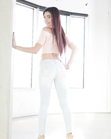 Solo girl Michelle Taylor sheds jeans and lingerie to spread shaved pussy