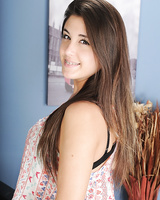 Magnetizing young teen elegantly undressing displaying her sexy butts