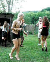 Lusty european sluts have some fully clothed pissing fun with a inky lad