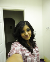 Brunette girlfriend type Ruby Reyes takes self shots on exposed boob in mirror