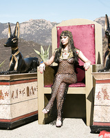 Latin woman in fishnet outfit Selena Rose baths outdoors and rubs breasts