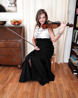 Shaved pussy and saggy tits of hot milf Silky Thighs Lou in stockings