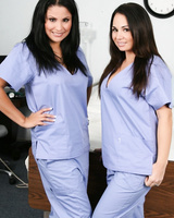 Lesbian nurses Sophia Lomeli & Holly West remove their scrubs while kissing