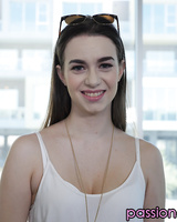 Sexy solo model Tali Dova uncovers her nice tits as she disrobes