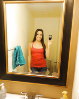 Teen babe Bailey Bam strips by the mirror and makes amateur shots