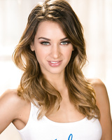 White teen Uma Jolie uncovers her small breasts attired in boy shorts