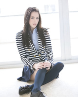 Hot brunette teen in sexy stockings takes off her blouse and plays a solo