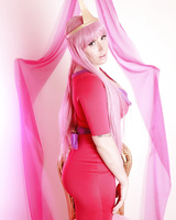 Hot cosplay babe Yuffie Yulan shows her big tits while stretching her cunt