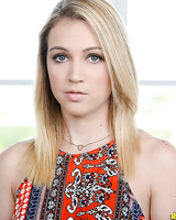 Pretty blonde female Cali Sparks revealing firm tits before masturbating