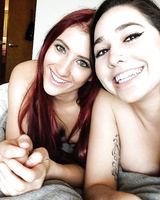 Teen lesbians Addison Ryder and Karlee Grey taking selfies while kissing