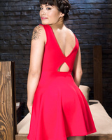 Asian and Caucassian women undress before sex in a basement dungeon