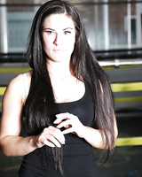 Sultry milf babe Athina Love shows her sporty body and hard nipples