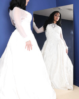 Solo models Mia Lelani and Bella Reese undress in front of a mirror