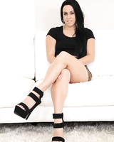 Hit babe Brooke Summers posing for sfw pics in short skirt and high heels