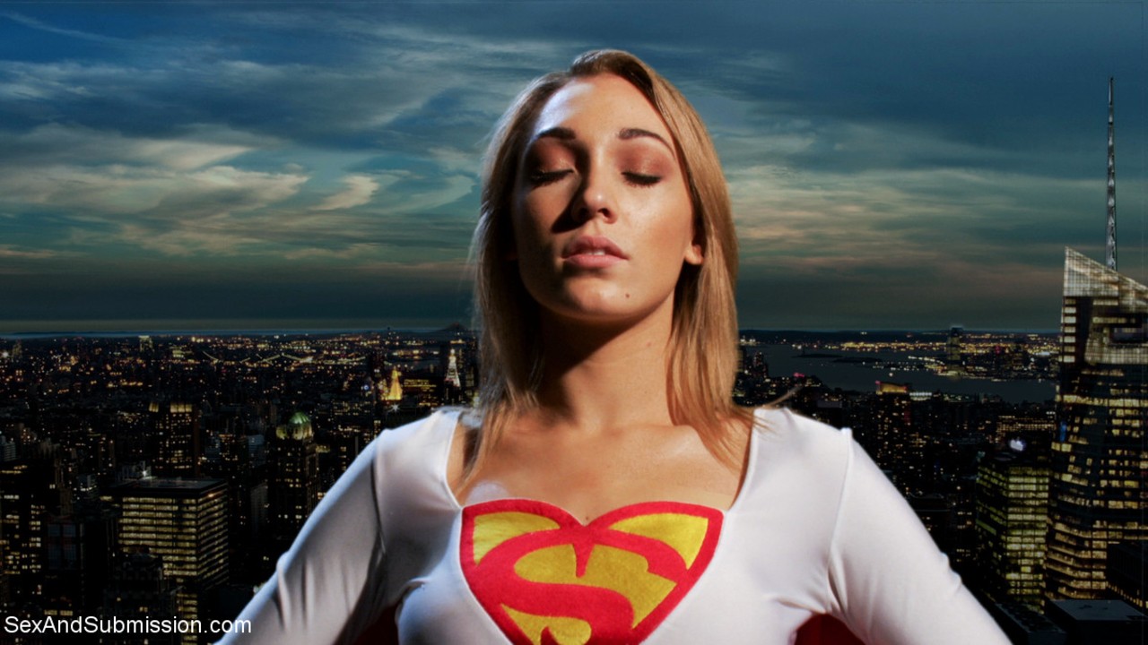 Blonde female superhero is captured and sexually used by her male captor