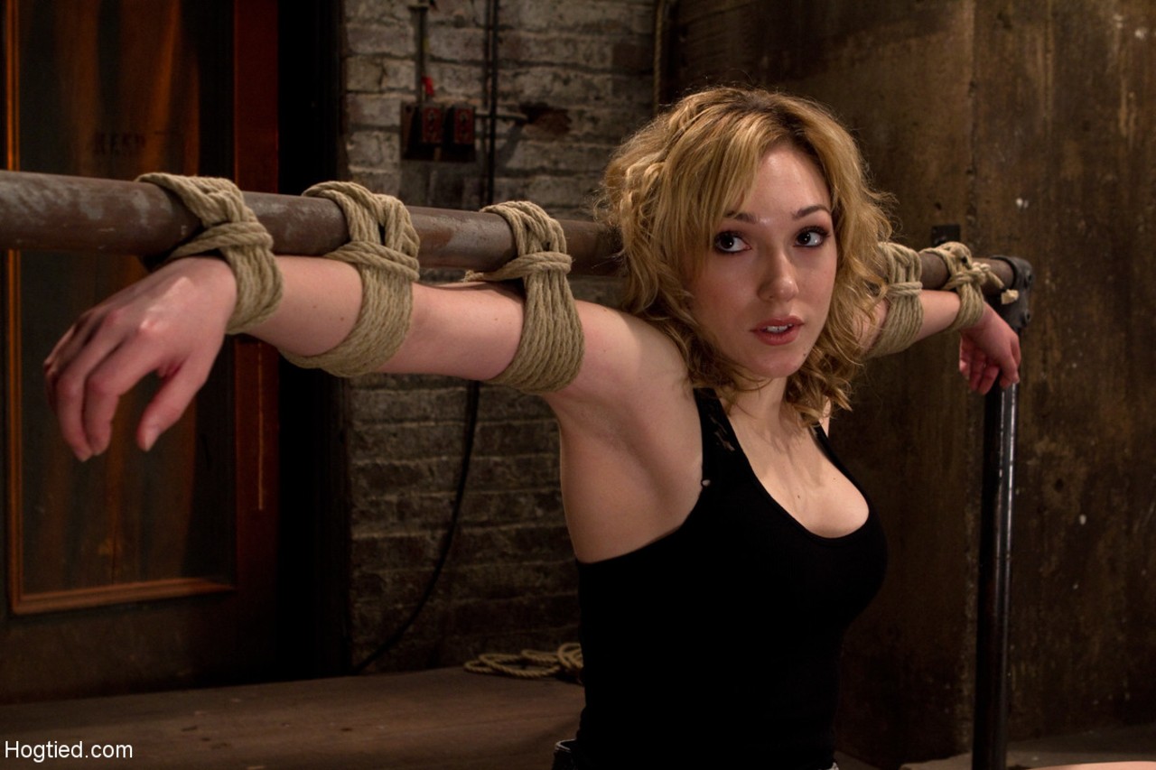 Cute Lily LaBeau gets dominated by getting bound in rope and gag-balled