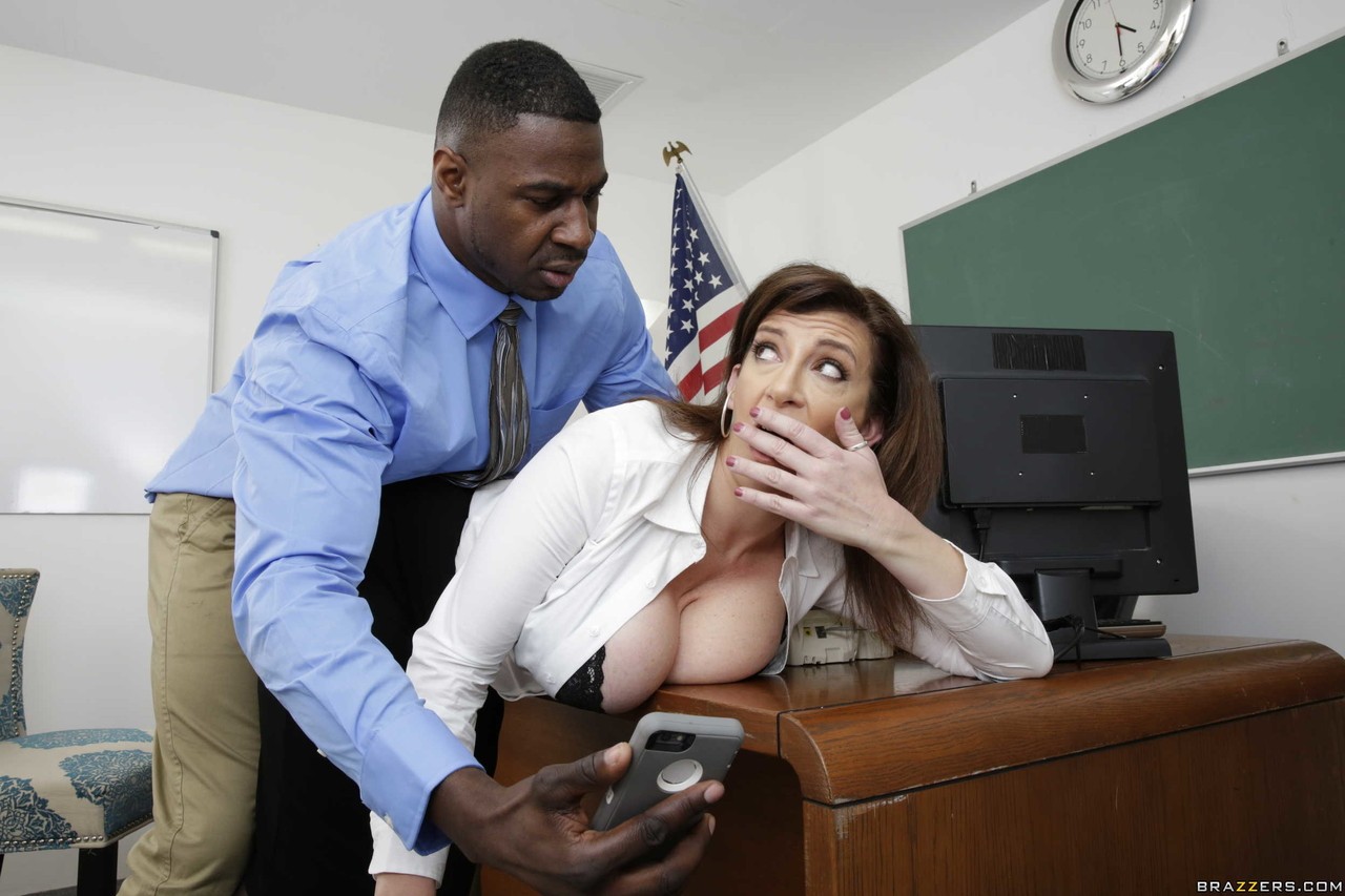 Thick professor Sara Jay seduces a black coworker with her big butt