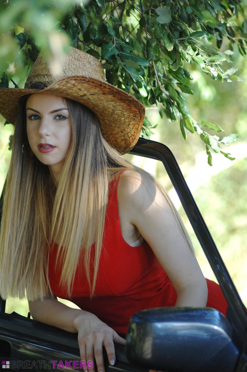 Glamour model Stella Cox removes her cowgirl attire until she's nakd