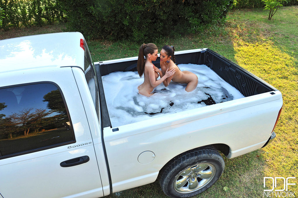 Nude females Subil Arch & Danika have lesbian sex in box of pickup truck