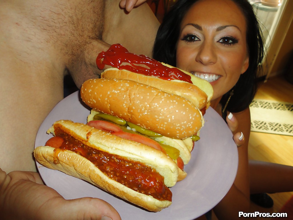 Brunette chick Tiffany Brookes licking large cock wrapped in hot dog bun