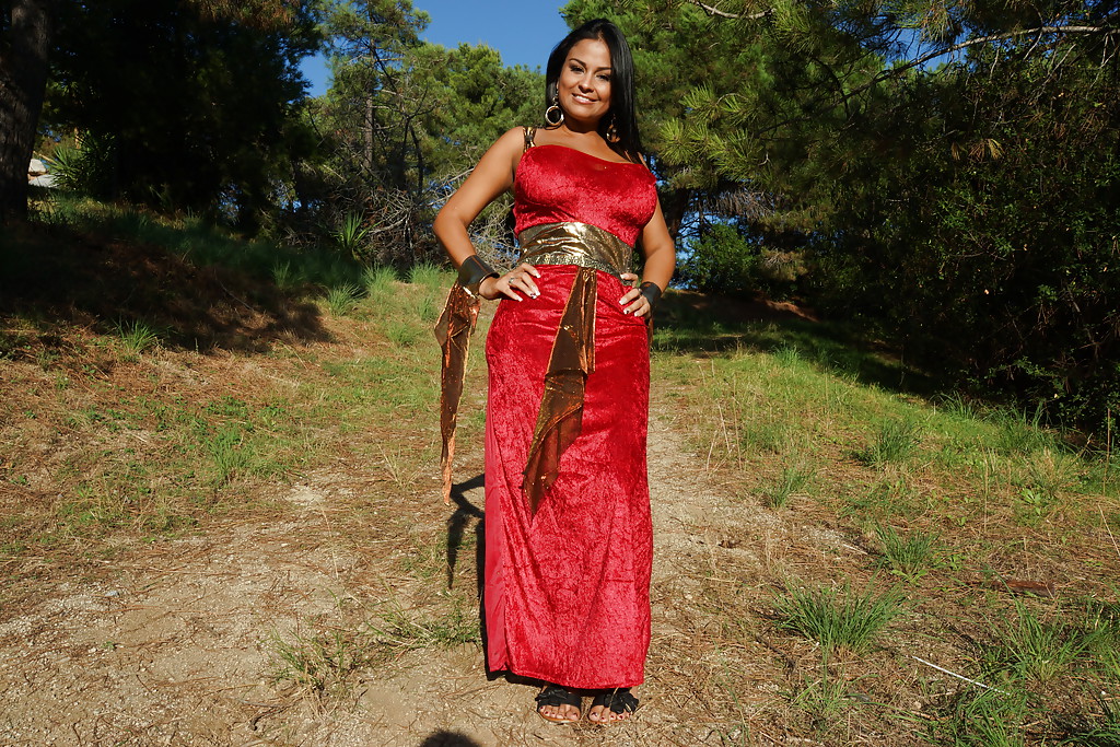 Latina milf Galilea is showing off outdoor in her sexy red dress