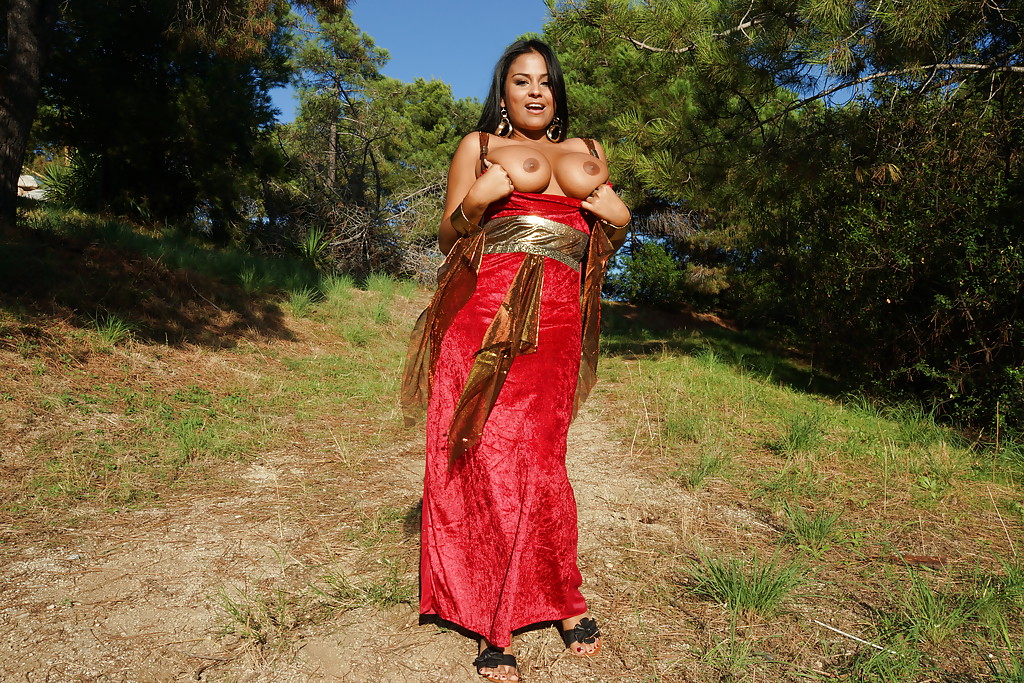 Latina milf Galilea is showing off outdoor in her sexy red dress