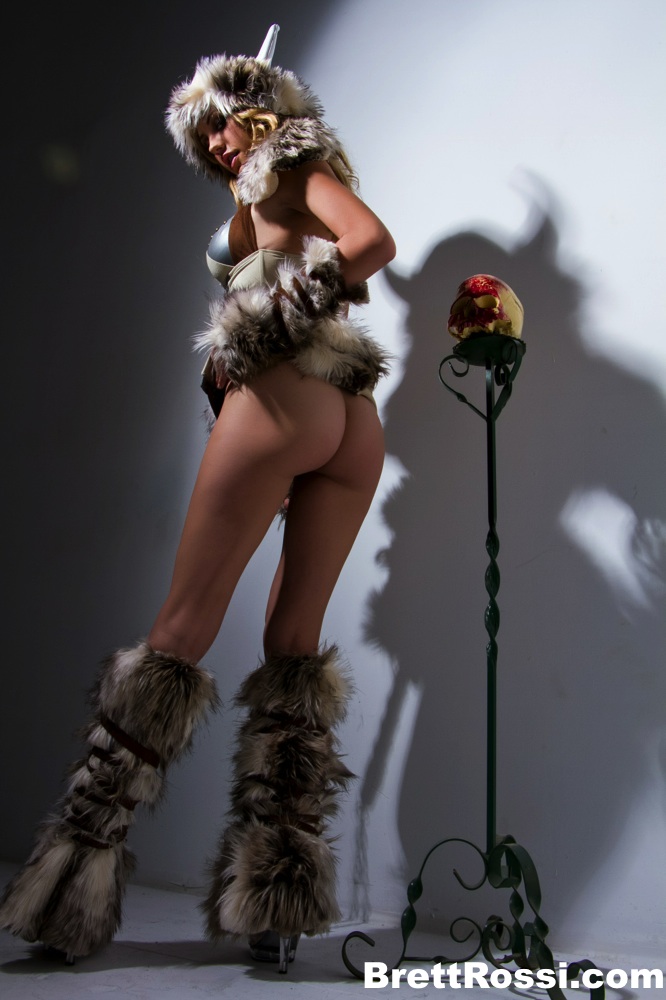 Solo model Brett Rossi shows off her girl parts attired in a viking outfit