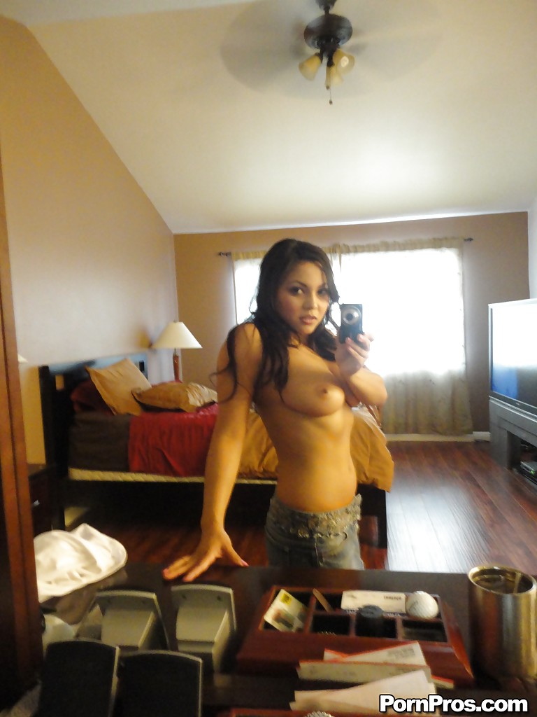 Sultry Latina female Adriana Luna snapping selfies of her big natural titties