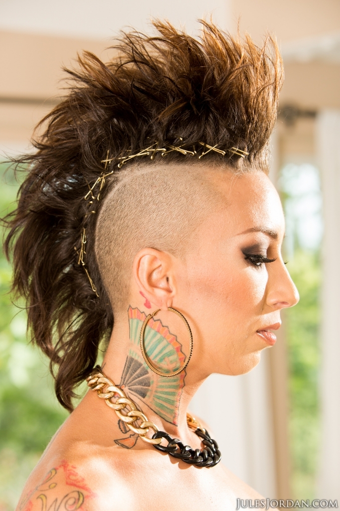 Solo model Bella Bellz flaunts her tattooed ass with hair in a mohawk cut