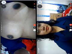 Naughty Indian chick shows her boobs during a video call with her friend