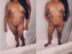 Indian whore undresses in the bathroom to show big nipples and dirty pussy