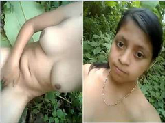 Young Desi whore is outdoors and she is taking XXX naked photo of her body