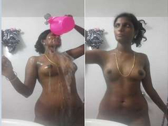 Very beautiful Indian chick makes her hot body wet and soapy while bathing